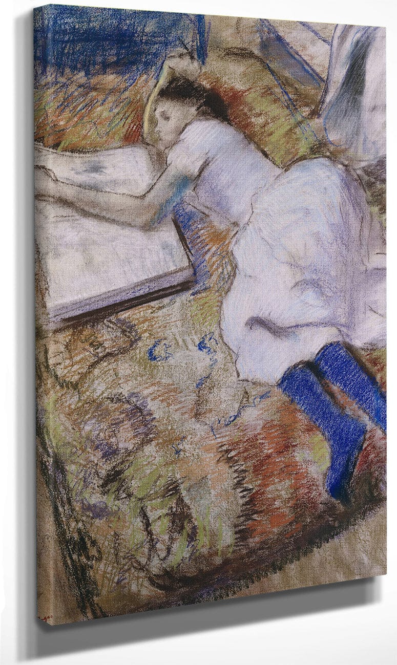 A Young Girl Stretched Out And Looking At An Album By Edgar Degas